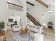 Bright living room featuring vaulted ceilings, wood beams, and an open floor plan at 2619 S Los Altos --, Mesa, AZ 85202