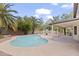 Backyard showcasing pool, mature landscaping, and an inviting covered patio at 2619 S Los Altos --, Mesa, AZ 85202