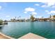 Beautiful waterfront homes with boats parked along the canal under a clear blue sky at 2619 S Los Altos --, Mesa, AZ 85202