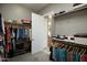 Walk-in closet with ample hanging space and shelving at 27083 W Marco Polo Rd, Buckeye, AZ 85396