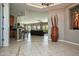 Open-concept layout showcases a smooth transition from foyer to living area at 27083 W Marco Polo Rd, Buckeye, AZ 85396