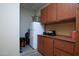 Overhead garage cabinets with counter and storage at 27083 W Marco Polo Rd, Buckeye, AZ 85396