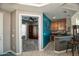 Stylish kitchen with a breakfast bar that seamlessly connects to the adjacent versatile bedroom at 27083 W Marco Polo Rd, Buckeye, AZ 85396