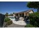 Beautiful backyard with pool, firepit, and outdoor seating, ideal for entertaining and enjoying the Arizona weather at 27083 W Marco Polo Rd, Buckeye, AZ 85396