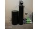 A water softener system with two tanks and bags of salt at 27083 W Marco Polo Rd, Buckeye, AZ 85396