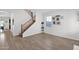 Inviting foyer with staircase leading to the upper level and plenty of natural light at 2950 E Dublin St, Gilbert, AZ 85295