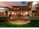 Inviting covered patio with tiled flooring, elegant columns, and comfortable seating for relaxation and entertaining at 3006 N Manor W Dr, Phoenix, AZ 85014