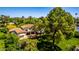 Charming home with manicured lawn and mature trees, creating a picturesque and inviting curb appeal at 3006 N Manor W Dr, Phoenix, AZ 85014