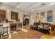 Bright living room with a bar area including a wine fridge and comfortable seating at 3006 N Manor W Dr, Phoenix, AZ 85014
