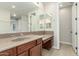 Bathroom featuring wood vanity and lots of countertop space at 3099 E Claxton Ct, Gilbert, AZ 85297