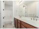 Bathroom featuring double sinks, vanity, and a separate tub and shower at 3099 E Claxton Ct, Gilbert, AZ 85297