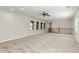 Upstairs loft area with cozy carpet and lots of natural light at 3099 E Claxton Ct, Gilbert, AZ 85297