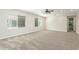 Loft with large windows and ceiling fan at 3099 E Claxton Ct, Gilbert, AZ 85297