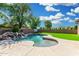 Backyard with a lovely pool and water feature at 3099 E Claxton Ct, Gilbert, AZ 85297