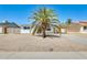 Charming single-story home with desert landscaping, covered parking, and a mature palm tree for added curb appeal at 3306 W Lupine Ave, Phoenix, AZ 85029