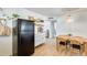 Spacious kitchen featuring a breakfast nook, modern appliances, and open shelving at 3306 W Lupine Ave, Phoenix, AZ 85029