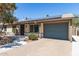 Charming home featuring solar panels, a garage, and low-maintenance landscaping at 3732 E Greenway Ln, Phoenix, AZ 85032