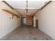 Spacious garage interior featuring built-in shelving and ample storage space at 3732 E Greenway Ln, Phoenix, AZ 85032