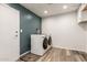 Updated laundry room with new washer/dryer at 3732 E Greenway Ln, Phoenix, AZ 85032