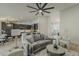 Spacious living area connects to a modern kitchen with stylish decor and ample natural light, perfect for Gathering at 3802 W Sheffield Ave, Chandler, AZ 85226
