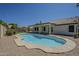 Private backyard pool and patio with landscaping provide a relaxing outdoor space at 3802 W Sheffield Ave, Chandler, AZ 85226