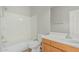 Clean bathroom with a tub, shower, and updated vanity at 4718 E Decatur St, Mesa, AZ 85205