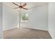 Bedroom with neutral carpet and single window at 4718 E Decatur St, Mesa, AZ 85205
