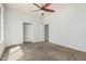 Spacious bedroom features a closet and bright light at 4718 E Decatur St, Mesa, AZ 85205
