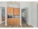 Eat-in kitchen featuring new appliances and an open floor plan at 4718 E Decatur St, Mesa, AZ 85205
