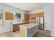 Charming kitchen featuring stainless steel appliances and custom backsplash at 4718 E Decatur St, Mesa, AZ 85205