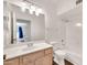 Updated bathroom featuring a single sink vanity, a large mirror, and a shower-over-tub combination at 4811 W Oakland St, Chandler, AZ 85226