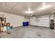 A clean and well-lit two-car garage offering ample space for parking and storage at 4811 W Oakland St, Chandler, AZ 85226