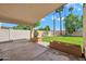 Covered patio with a view of the green backyard, perfect for outdoor entertaining and relaxation at 4811 W Oakland St, Chandler, AZ 85226