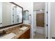 This bathroom features a double vanity with granite countertops, a toilet, and a shower at 5208 S Gold Leaf Pl, Chandler, AZ 85249