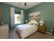 Calm bedroom featuring neutral decor and matching nightstands at 5208 S Gold Leaf Pl, Chandler, AZ 85249