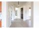 Bright hallway showcasing neutral walls and tiled floors at 5208 S Gold Leaf Pl, Chandler, AZ 85249