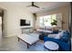 Inviting living room with modern furnishings, neutral colors, and bright natural light at 5208 S Gold Leaf Pl, Chandler, AZ 85249