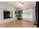 Versatile bonus room features built-in storage, hardwood floors, and abundant natural light at 5215 W Del Rio St, Chandler, AZ 85226