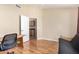 Office space with desk and futon featuring an open doorway to the kitchen at 5215 W Del Rio St, Chandler, AZ 85226