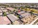 Aerial shot of neighborhood with red pin highlighting the property's roof, backyard, and community at 5616 S Caisson Way, Mesa, AZ 85212