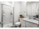 Clean, bright bathroom featuring a glass shower and marble vanity with storage at 5616 S Caisson Way, Mesa, AZ 85212