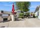 An outdoor kitchen area complete with built-in grill and seating, perfect for entertaining at 5909 W Blue Sky Dr, Phoenix, AZ 85083