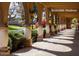Charming walkway with decorative pillars and lush landscaping, ideal for a leisurely stroll at 7930 E Camelback Rd # 301, Scottsdale, AZ 85251