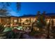Stunning backyard oasis with lush landscaping, a sparkling pool, and a relaxing atmosphere, perfect for outdoor enjoyment at 9417 E Charter Oak Dr, Scottsdale, AZ 85260