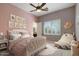 bedroom featuring a plush bed, charming decor, and a cozy atmosphere at 9417 E Charter Oak Dr, Scottsdale, AZ 85260