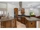Spacious kitchen showcasing a large island, stainless steel appliances, and open concept design at 9417 E Charter Oak Dr, Scottsdale, AZ 85260