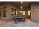 Inviting outdoor patio with comfortable seating, perfect for enjoying al fresco dining and relaxing gatherings at 9417 E Charter Oak Dr, Scottsdale, AZ 85260