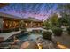 Beautiful backyard with a refreshing outdoor pool and well-equipped BBQ area, perfect for relaxing and entertaining guests at 9417 E Charter Oak Dr, Scottsdale, AZ 85260