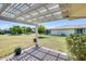 Relaxing backyard patio with a trellis offering shaded outdoor space at 9805 W Burns Dr, Sun City, AZ 85351