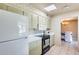 Spacious kitchen offering updated appliances, bright cabinetry and plenty of countertop workspace at 9805 W Burns Dr, Sun City, AZ 85351